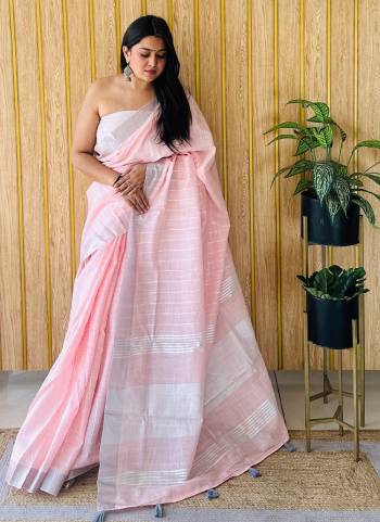 Garb These Fastive Wear Saree in Fine Colored.These Saree And Blouse is Fabricated On Linen.Its Beautified With Wevon Designer.