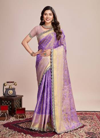 Attrective This Partywear Saree Paired With Blouse.This Saree And Blouse Are Soft Silk Based Fabric With Wevon Jari Designer. Buy This Pretty Saree Now.