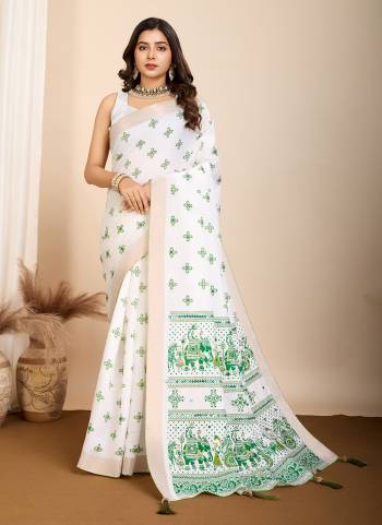 Garb This Partywear Saree Paired With Blouse.This Saree And Blouse Are Cotton Based Fabric With Table Printed Designer With Hand Work. Buy This Pretty Saree Now.