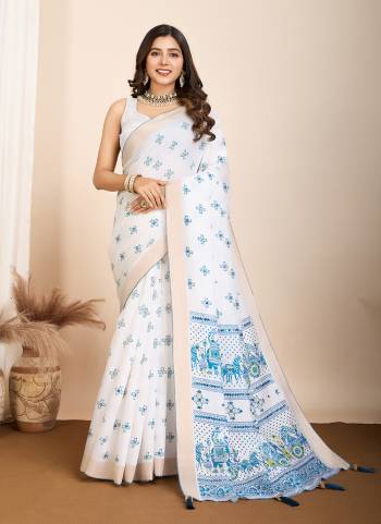 Garb This Partywear Saree Paired With Blouse.This Saree And Blouse Are Cotton Based Fabric With Table Printed Designer With Hand Work. Buy This Pretty Saree Now.
