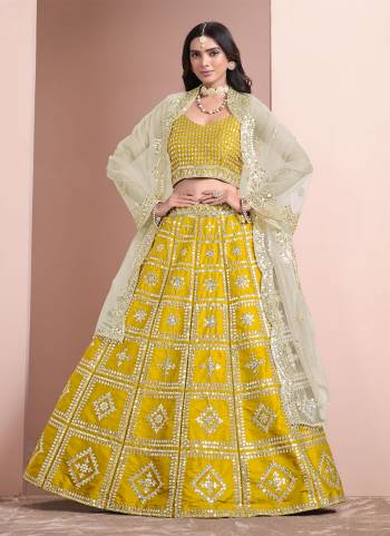 For A Designer Look,Grab These Lehenga Choli in Fine Colored.These Lehenga And Blouse Are Fabricated On Art Silk Pair With Net Dupatta.Its Beautified With Designer Sequance Embroidery Work.