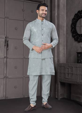 Looking These Party Wear Mans Wear Kutra Payjama With Jacket wearing this fashionable. Tailored Kurta Pajama With Koti On Viscose Fabriced With Designer Thread,Sequance Embroidery Work and fashioned with a banded collar for a dash of style.