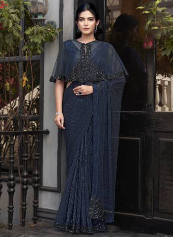 Look Attrective These Fancy Designer Party Wear Saree in Fine Colored.These Saree Are Armani Tulle And Blouse Maharani Net is Fabricated.Its Beautified Heavy Desiger Sequance Embroidery,Hand Beads Stone Work.