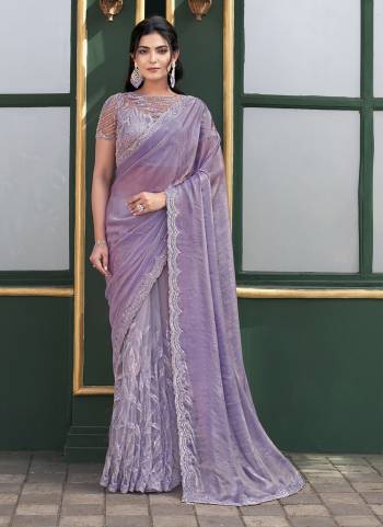 Look Attrective These Fancy Designer Party Wear Saree in Fine Colored.These Saree Are Versace Illusion And Blouse Butterfly Net is Fabricated.Its Beautified Heavy Desiger Sequance Embroidery,Hand Beads Stone Work.
