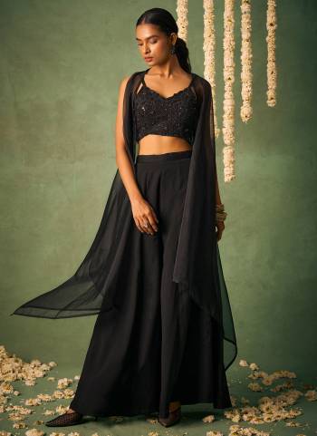 Looking These Party Wear Indo Western Sharara Suit in Fine Colored Pair With Bottom.These Top And Bottom Are Fabricated On Chinon Pair With Organza Cape Dupatta.Its Beautified With Heavy Designer Khatli Work.