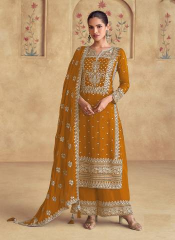 Looking These Party Wear Designer Plazzo Suits in Fine Colored Pair With Dupatta.These Top And Dupatta Are Fabricated On Georgette Pair With Georgette Bottom.Its Beautified With Designer Embroidery Work.
