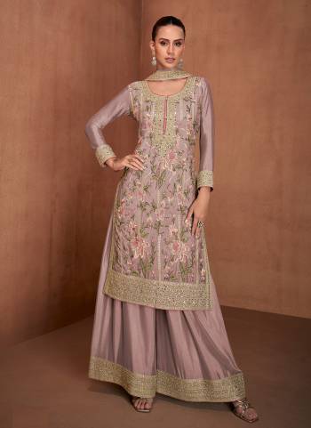 Garb These Designer Free Size Stitched Plazzo Suits in Fine Colored Pair With Dupatta.These Top Are Chinon And Dupatta Are Fabricated On Chinon Pair With Chinon Bottom.Its Beautified With Heavy Designer Multy Thread Embroidery Work
