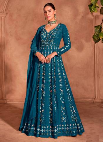 Garb These Party Wear Designer Anarkali Suits in Fine Colored Pair With Dupatta.These Top And Dupatta Are Fabricated On Chinon Pair With Santoon Bottom.Its Beautified With Designer Heavy Embroidery Work.