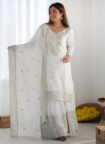 Attrective These Beautiful Looking Readymade Sharara Suits.These Top And Bottom is Fabricated On Chinon Silk And Chinon Silk Dupatta.Its Beautified With Designer Sequance Embroidery Work .