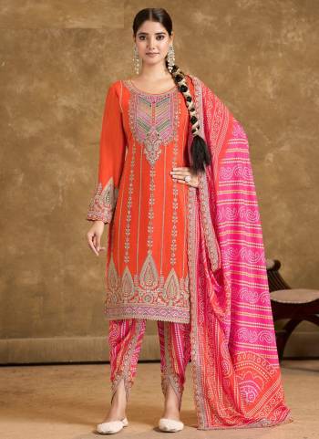 Garb These Designer Free Size Stitched Dhoti Style Suits in Fine Colored Pair With Dupatta.These Top Are Chinon And Dupatta Are Fabricated On Chinon Pair With Chinon Bottom.Its Beautified With Heavy Designer Embroidery Work With Printed.