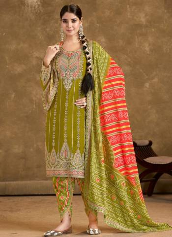 Garb These Designer Free Size Stitched Dhoti Style Suits in Fine Colored Pair With Dupatta.These Top Are Chinon And Dupatta Are Fabricated On Chinon Pair With Chinon Bottom.Its Beautified With Heavy Designer Embroidery Work With Printed.