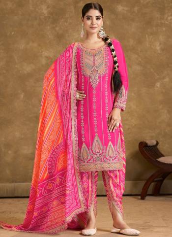 Garb These Designer Free Size Stitched Dhoti Style Suits in Fine Colored Pair With Dupatta.These Top Are Chinon And Dupatta Are Fabricated On Chinon Pair With Chinon Bottom.Its Beautified With Heavy Designer Embroidery Work With Printed.