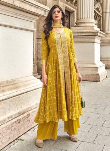 Looking These Designer Free Size Stitched Plazzo Suits in Fine Colored Pair With Dupatta.These Top Are Jacquard And Dupatta Are Fabricated On Nazmin Pair With Chinon Bottom.Its Beautified With Wevon Designer With Embroidery Work.