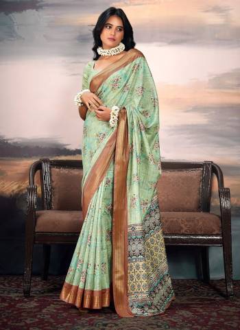 Looking These Party Wear Saree in Fine Colored.These Saree Are Cotton Silk And Blouse is Fabricated On Cotton Silk.Its Beautified With Weaving Jari Border Designer With Digital Printed.
