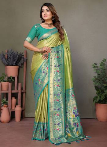 Looking These Festive Wear Saree in Fine Colored.These Saree And Blouse is Fabricated On Banarasi Tissue Silk.Its Beautified With Wevon Paithani Designer.