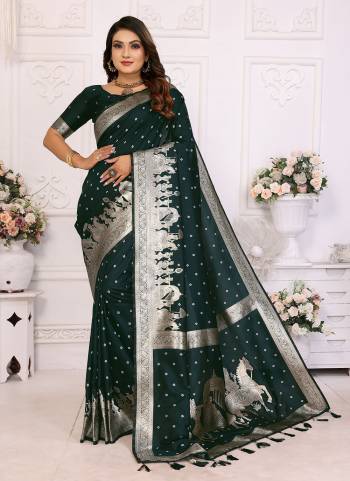 Garb These Festive Wear Saree in Fine Colored.These Saree And Blouse is Fabricated On Kochi Silk.Its Beautified With Wevon Jari Bandhej Designer.