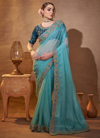 Attrctive These Fancy Party Wear Saree in Fine Colored.These Saree Are Organza And Blouse is Fabricated On Art Silk Pair.Its Beautified With Fancy Disigner Embroidery Work.