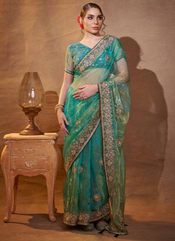Attrctive These Fancy Party Wear Saree in Fine Colored.These Saree And Blouse is Fabricated On Tissue Organza Pair.Its Beautified With Fancy Disigner Embroidery Work.