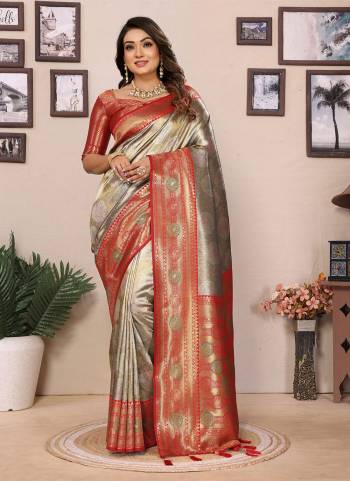 Attrective These Festive Wear Saree in Fine Colored.These Saree And Blouse is Fabricated On Banarasi Tissue Silk.Its Beautified With Wevon Paithani Jari Designer.
