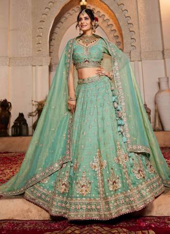 Attrective Looking This Partywear Fine Color Fancy Heavy Designer Choli And Lahenga Fabriced On Tissue And Dupatta Tissue In Fabricated Beautified With Attrective Designer Heavy Embroidery,Beads And Stone Work. Buy Now.