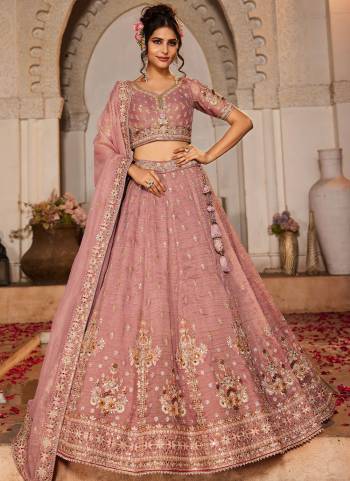 Attrective Looking This Partywear Fine Color Fancy Heavy Designer Choli And Lahenga Fabriced On Tissue And Dupatta Tissue In Fabricated Beautified With Attrective Designer Heavy Embroidery,Beads And Stone Work. Buy Now.