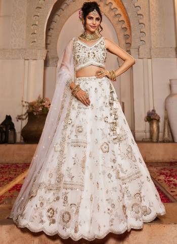 Attrective Looking This Partywear Fine Color Fancy Heavy Designer Choli And Lahenga Fabriced On Tissue And Dupatta Net In Fabricated Beautified With Attrective Designer Heavy Embroidery,Beads And Stone Work. Buy Now.