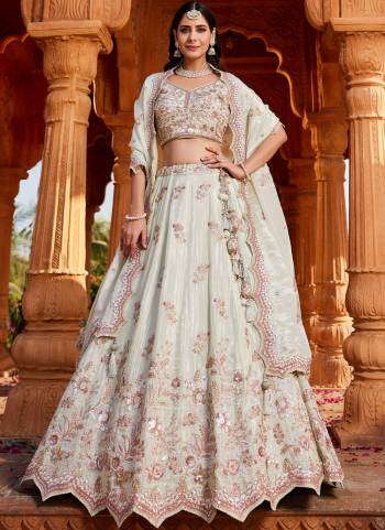 Attrective Looking This Partywear Fine Color Fancy Heavy Designer Choli And Lahenga Fabriced On Tissue And Dupatta Tissue In Fabricated Beautified With Attrective Designer Heavy Embroidery,Beads And Stone Work. Buy Now.