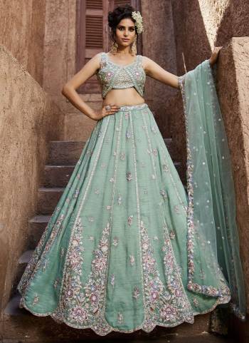 Attrective Looking This Partywear Fine Color Fancy Heavy Designer Choli And Lahenga Fabriced On Tissue And Dupatta Tissue In Fabricated Beautified With Attrective Designer Heavy Embroidery,Beads And Stone Work. Buy Now.