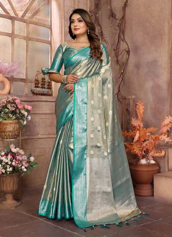 Looking These Party Wear Saree in Fine Colored.These Saree And Blouse is Fabricated On Tissue Silk.Its Beautified With Wevon Handloom Designer.