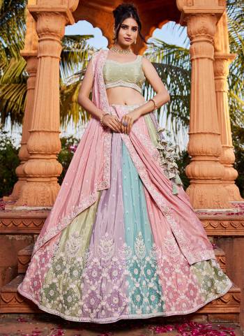 Attrective Looking This Partywear Fine Color Fancy Heavy Designer Choli And Lahenga Fabriced On Chiffon And Dupatta Chiffon In Fabricated Beautified With Attrective Designer Heavy Embroidery,Beads And Stone Work. Buy Now.