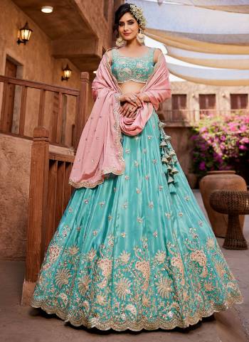 Attrective Looking This Partywear Fine Color Fancy Heavy Designer Choli And Lahenga Fabriced On Satin And Dupatta Chiffon In Fabricated Beautified With Attrective Designer Heavy Sequance Embroidery Work. Buy Now.