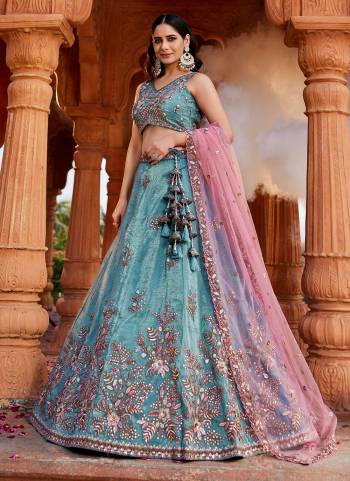 Attrective Looking This Partywear Fine Color Fancy Heavy Designer Choli And Lahenga Fabriced On Tissue And Dupatta Net In Fabricated Beautified With Attrective Designer Heavy Embroidery,Beads And Stone Work. Buy Now.