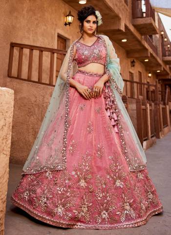 Attrective Looking This Partywear Fine Color Fancy Heavy Designer Choli And Lahenga Fabriced On Tissue And Dupatta Net In Fabricated Beautified With Attrective Designer Heavy Embroidery,Beads And Stone Work. Buy Now.