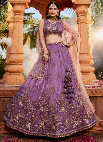 Attrective Looking This Partywear Fine Color Fancy Heavy Designer Choli And Lahenga Fabriced On Tissue And Dupatta Net In Fabricated Beautified With Attrective Designer Heavy Embroidery,Beads And Stone Work. Buy Now.