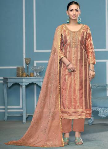 Garb These Suit in Fine Colored Pair With Bottom And Dupatta.These Top Are Viscose Organza And Dupatta Are Fabricated On Organza Pair With Dull Santoon Bottom.Its Beautified With Wevon Designer,Embroidery, Hand Work.