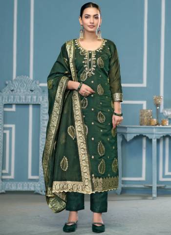 Garb These Suit in Fine Colored Pair With Bottom And Dupatta.These Top Are Modal Banarasi And Dupatta Are Fabricated On Banarasi Pair With Dull Santoon Bottom.Its Beautified With Wevon Designer, Embroidery, Hand Work.