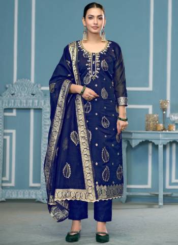 Garb These Suit in Fine Colored Pair With Bottom And Dupatta.These Top Are Modal Banarasi And Dupatta Are Fabricated On Banarasi Pair With Dull Santoon Bottom.Its Beautified With Wevon Designer, Embroidery, Hand Work.