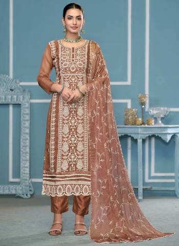 Garb These Suit in Fine Colored Pair With Bottom And Dupatta.These Top Are Viscose Organza And Dupatta Are Fabricated On Nazmin Pair With Santoon Bottom.Its Beautified With Designer Embroidery Work.