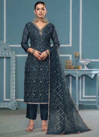Looking These Suit in Fine Colored Pair With Bottom And Dupatta.These Top Are Viscose Organza And Dupatta Are Fabricated On Organza Pair With Dull Santoon Bottom.Its Beautified With Wevon Designer,Embroidery, Hand Work.