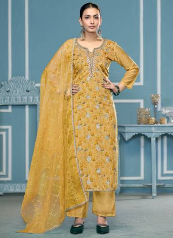 Looking These Suit in Fine Colored Pair With Bottom And Dupatta.These Top Are Viscose Organza And Dupatta Are Fabricated On Organza Pair With Dull Santoon Bottom.Its Beautified With Wevon Designer,Embroidery, Hand Work.