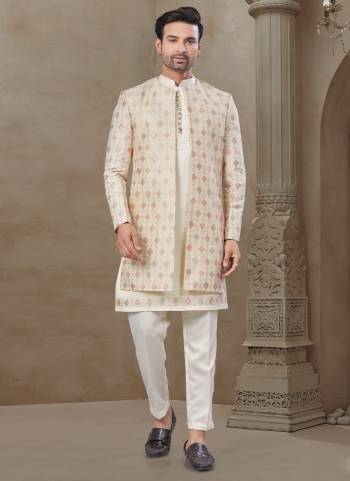 Looking These Party Wear Mans Wear Indo Western Top Bottom With Jacket wearing this fashionable. Tailored Top Bottom Are Malai Silk And Jacket On Jacquard Fabriced With Designer Embroidery Work,Position Printed Jacket and fashioned with a banded collar for a dash of style.