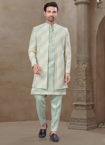 Looking These Party Wear Mans Wear Indo Western Top Bottom With Jacket wearing this fashionable. Tailored Top Bottom Are Malai Silk And Jacket On Mysore Silk Fabriced With Designer Embroidery Work,Position Printed Jacket and fashioned with a banded collar for a dash of style.