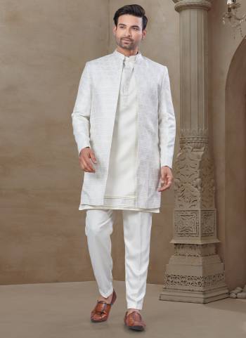 Looking These Party Wear Mans Wear Indo Western Top Bottom With Jacket wearing this fashionable. Tailored Top Bottom Are Malai Silk And Jacket On Jacquard Fabriced With Designer Embroidery Work,Position Printed Jacket and fashioned with a banded collar for a dash of style.
