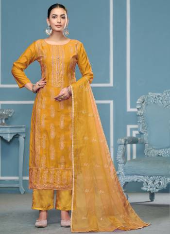 Looking These Suit in Fine Colored Pair With Bottom And Dupatta.These Top Are Roman Cotton And Dupatta Are Fabricated On Organza Pair With Dull Santoon Bottom.Its Beautified With Designer Embroidery, Hand Work.