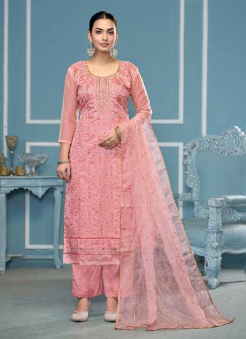 Looking These Suit in Fine Colored Pair With Bottom And Dupatta.These Top Are Viscose Organza And Dupatta Are Fabricated On Organza Pair With Dull Santoon Bottom.Its Beautified With Designer Hand Work.