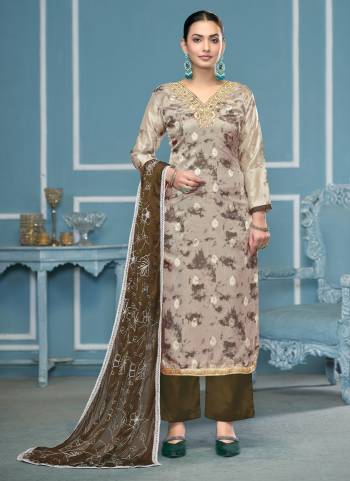 Looking These Suit in Fine Colored Pair With Bottom And Dupatta.These Top Are Organza Banarasi And Dupatta Are Fabricated On Organza Pair With Dull Santoon Bottom.Its Beautified With Designer Printed,Hand Work.
