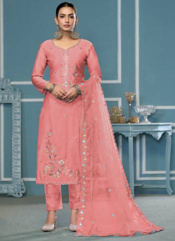 Looking These Suit in Fine Colored Pair With Bottom And Dupatta.These Top Are Roman Cotton And Dupatta Are Fabricated On Organza Pair With Dull Santoon Bottom.Its Beautified With Designer Embroidery, Hand Work.