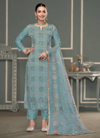 Garb These Suit in Fine Colored Pair With Bottom And Dupatta.These Top Are Roman Cotton And Dupatta Are Fabricated On Nazmin Pair With Dull Santoon Bottom.Its Beautified With Designer Embroidery,Hand Work.