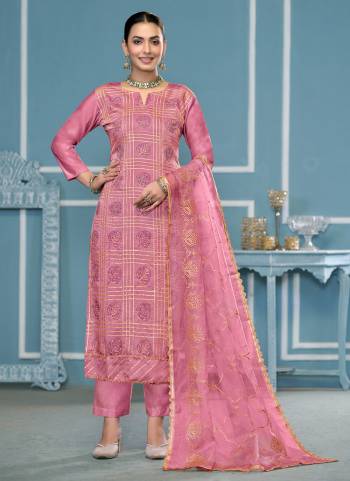 Garb These Suit in Fine Colored Pair With Bottom And Dupatta.These Top Are Roman Cotton And Dupatta Are Fabricated On Nazmin Pair With Dull Santoon Bottom.Its Beautified With Designer Embroidery,Hand Work.