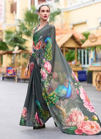 Looking These Party Wear Saree in Fine Colored.These Saree Are Georgette And Blouse is Fabricated On Georgette.Its Beautified With Designer Printed.